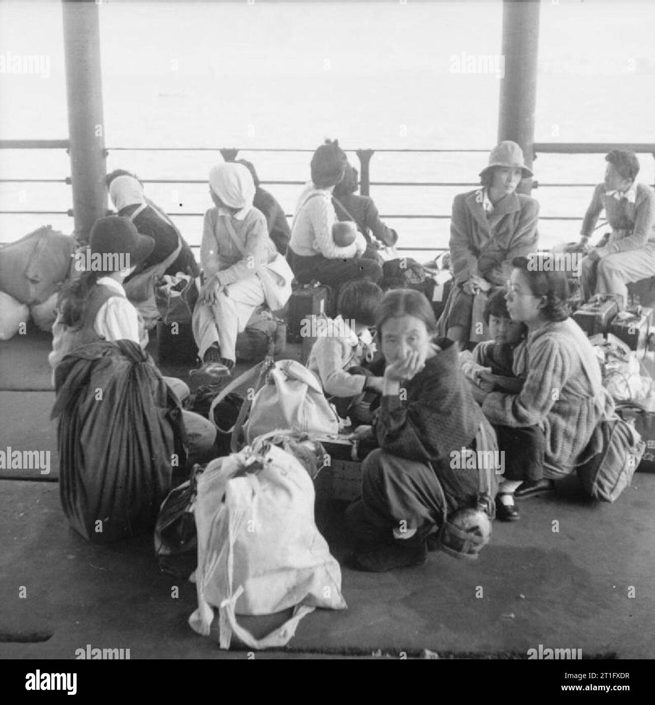 The British Reoccupation of Hong Kong Japanese civilian internees wait ...