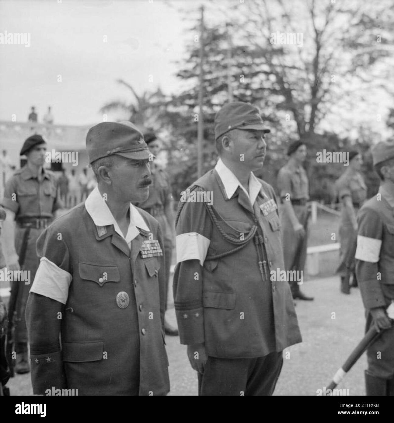 The British Reoccupation of Malaya General Itagaki, commander of the Japanese 7 Area Army, and his Chief of Staff, General Ayabe, after surrendering their swords at the formal ceremony of surrender held in the grounds of Headquarters Malaya Command, Kuala Lumpur. Stock Photo