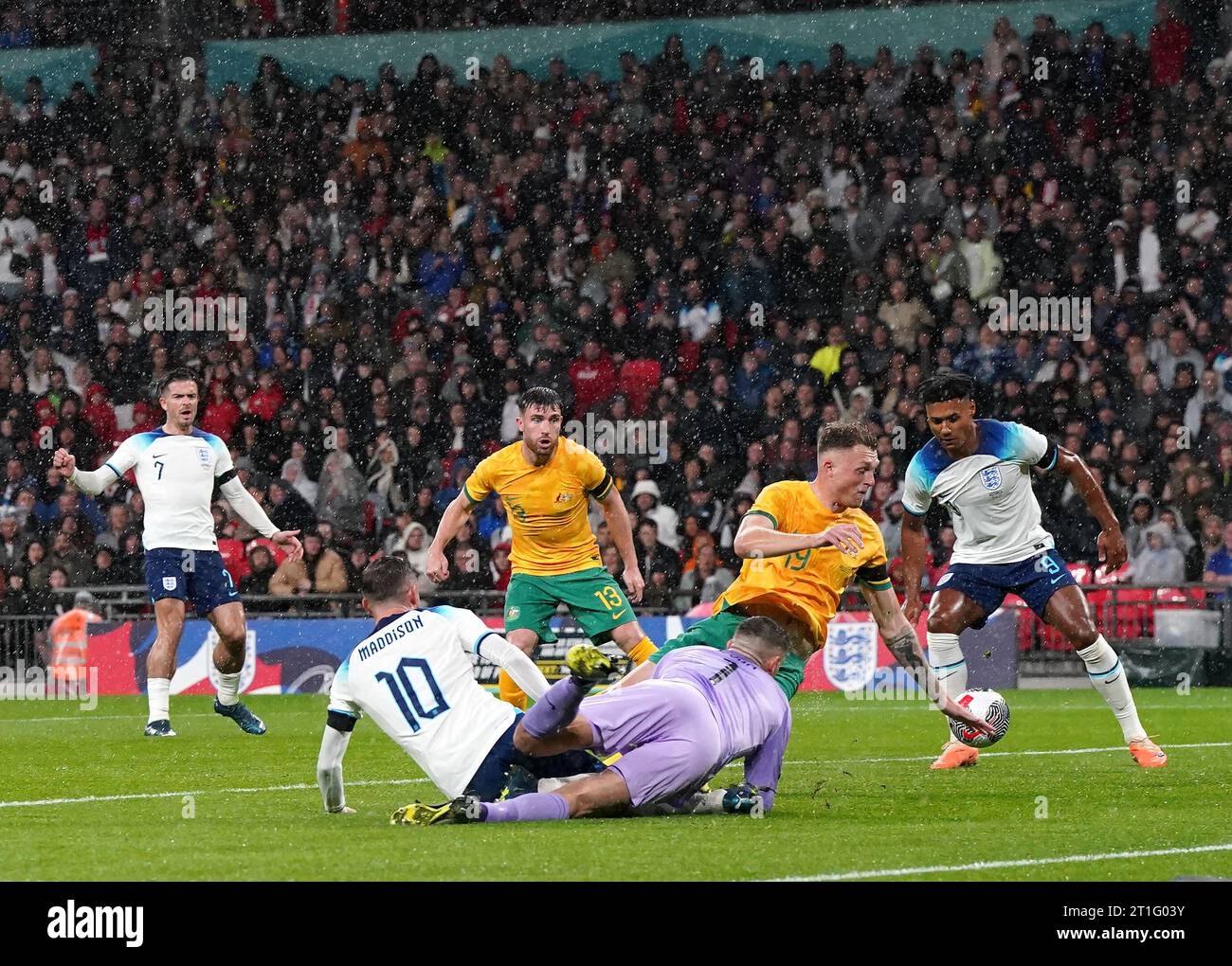 England's James Maddison collides with Australia goalkeeper Mathew Ryan during the international friendly match at Wembley Stadium, London. Picture date: Friday October 13, 2023. Stock Photo