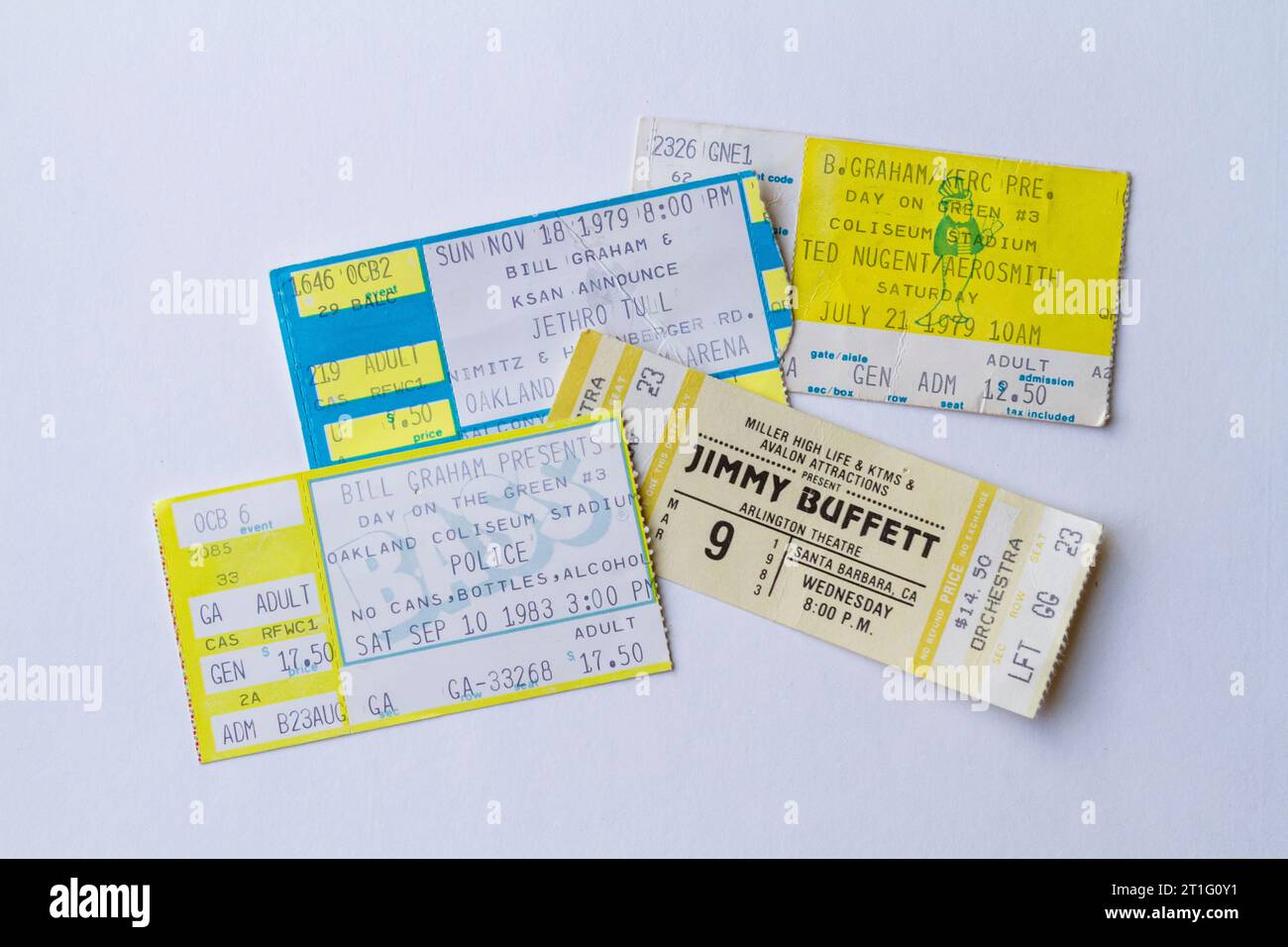 Several concert ticket stubs from popular bands in the late 1970s to early 1980s, which could be used to highlight how much prices have increased. Stock Photo