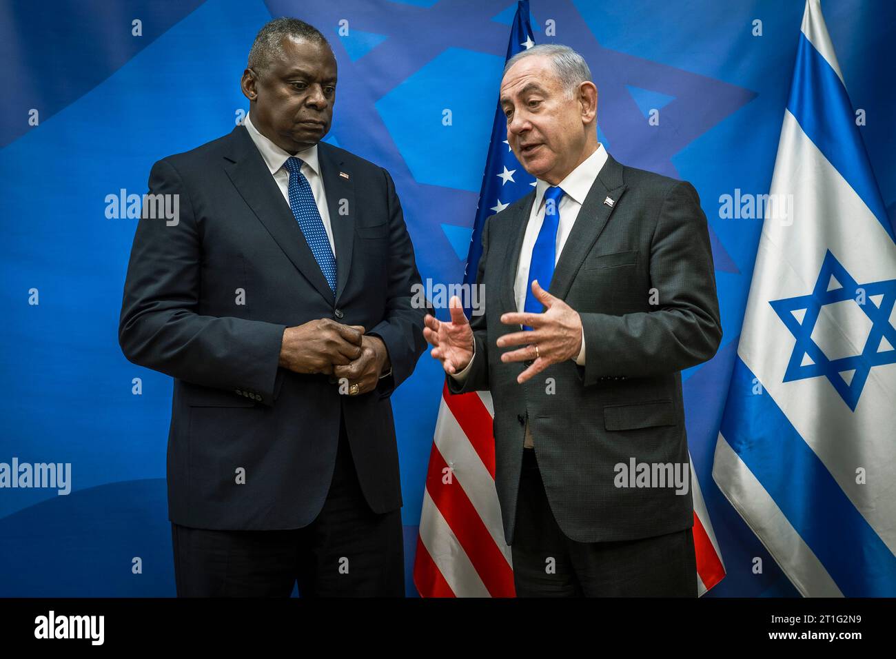 Tel Aviv, Israel. 13th Oct, 2023. U.S. Secretary of Defense Lloyd Austin, left, listens to Israeli Prime Minister Benjamin Netanyahu, right, before the start of a meeting with the War Cabinet, October 13, 2023 in Tel Aviv, Israel. Austin assured Israel leader that the USA stand with the Israel people following the brutal Hamas attacks that killed more than 1,000 Israeli civilians. Credit: Chad McNeeley/DOD Photo/Alamy Live News Stock Photo