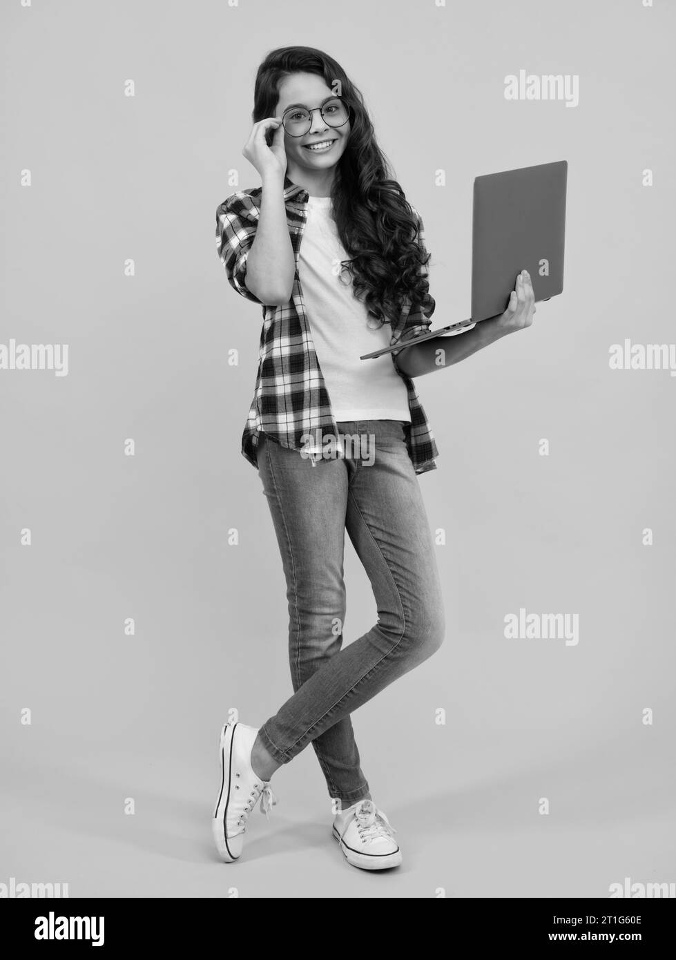 Student school girl with laptop on isolated studio background. Video ...