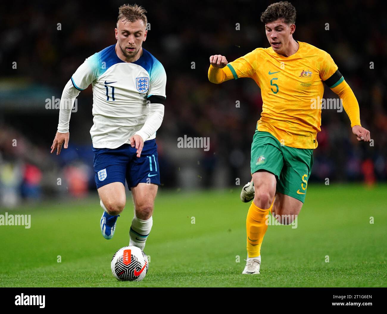 England's Jarrod Bowen (left) and Australia's Jordan Bos battle for the ball during the international friendly match at Wembley Stadium, London. Picture date: Friday October 13, 2023. Stock Photo
