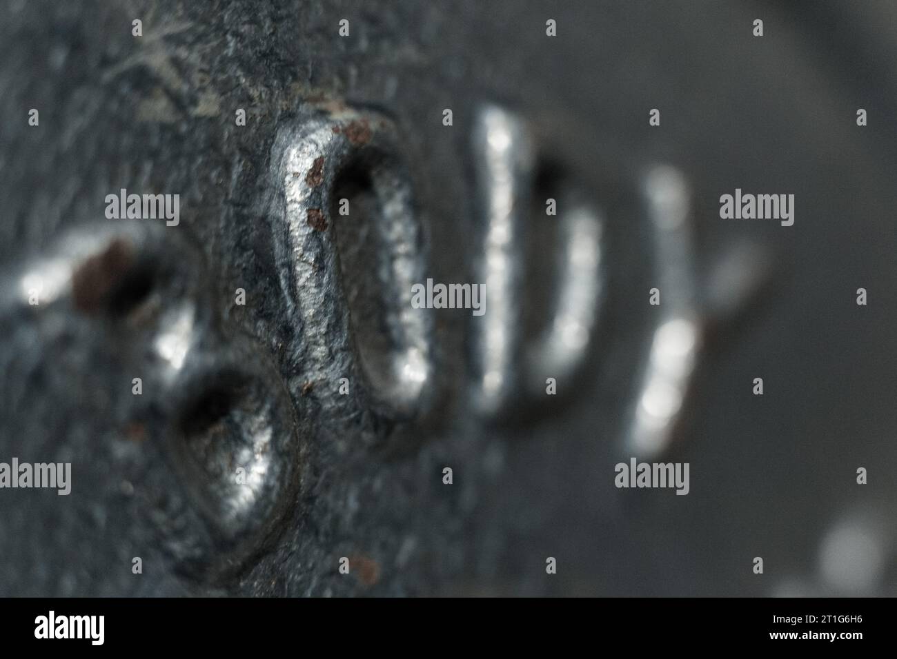 A close up of the word body on a weight for fitness Stock Photo