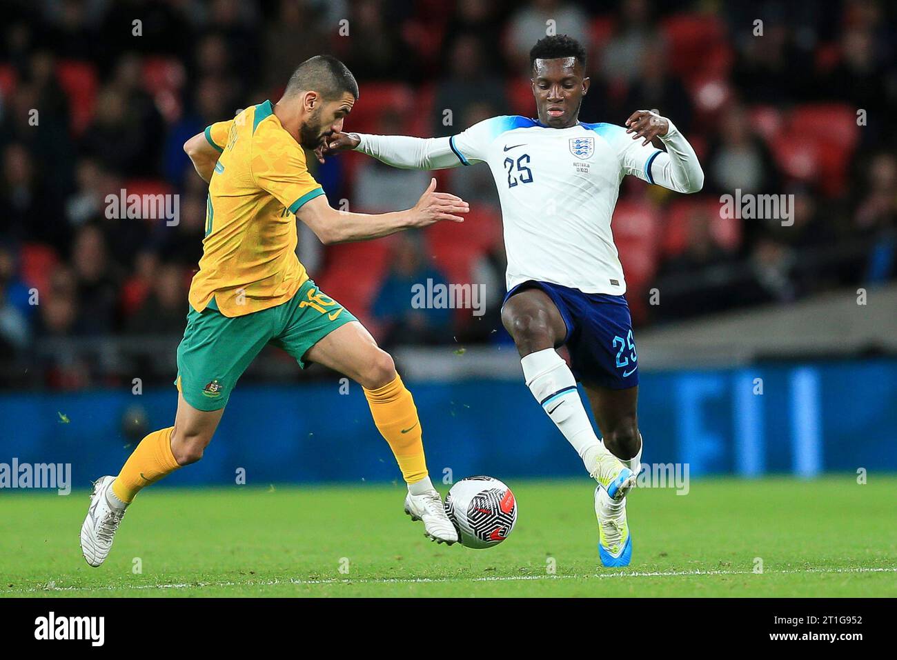 London, UK. 13th Oct, 2023. Aziz Behich of Australia and Eddie Nketiah of England during the International Friendly match between England and Australia at Wembley Stadium on October 13th 2023 in London, England. (Photo by Daniel Chesterton/phcimages.com) Credit: PHC Images/Alamy Live News Stock Photo