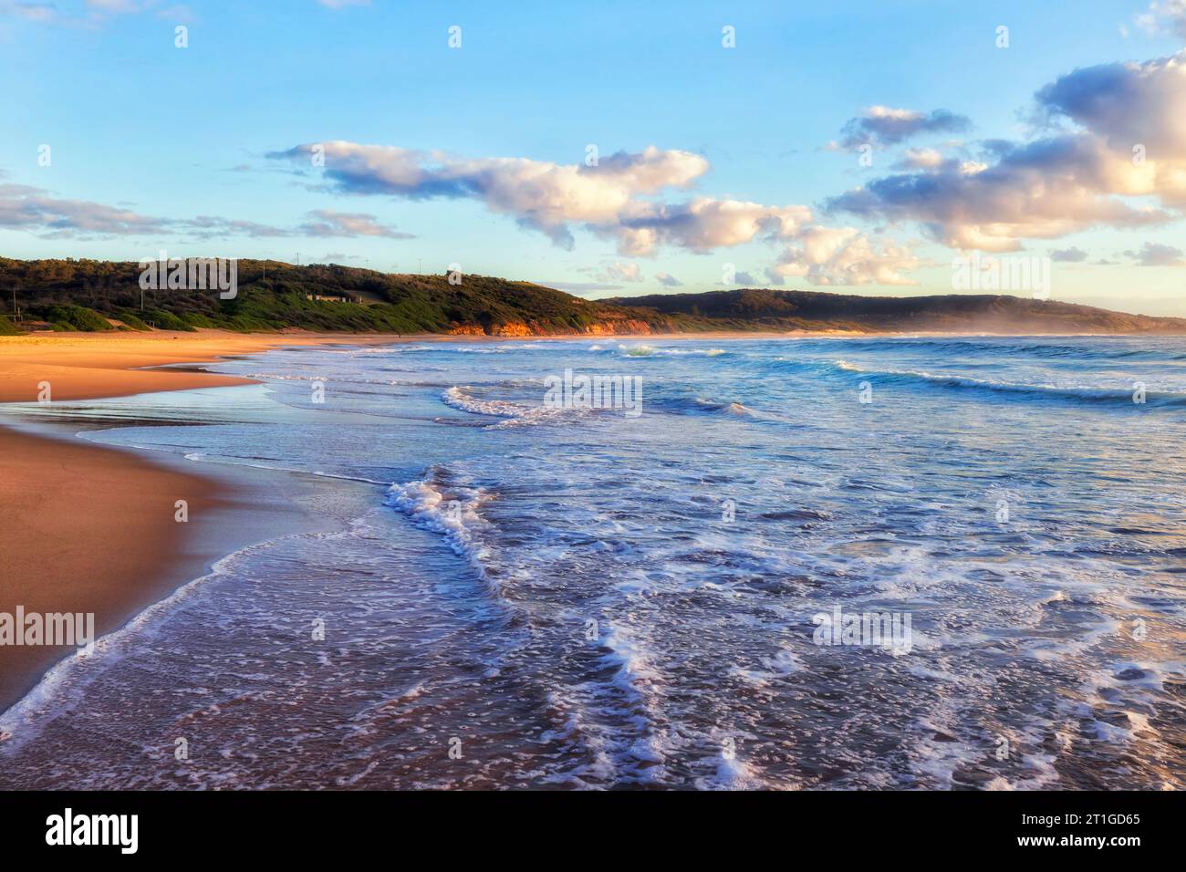 Middle Camp beach at Catherine Hill bay coastal town of Australia on Pacific ocean - soft morning light. Stock Photo