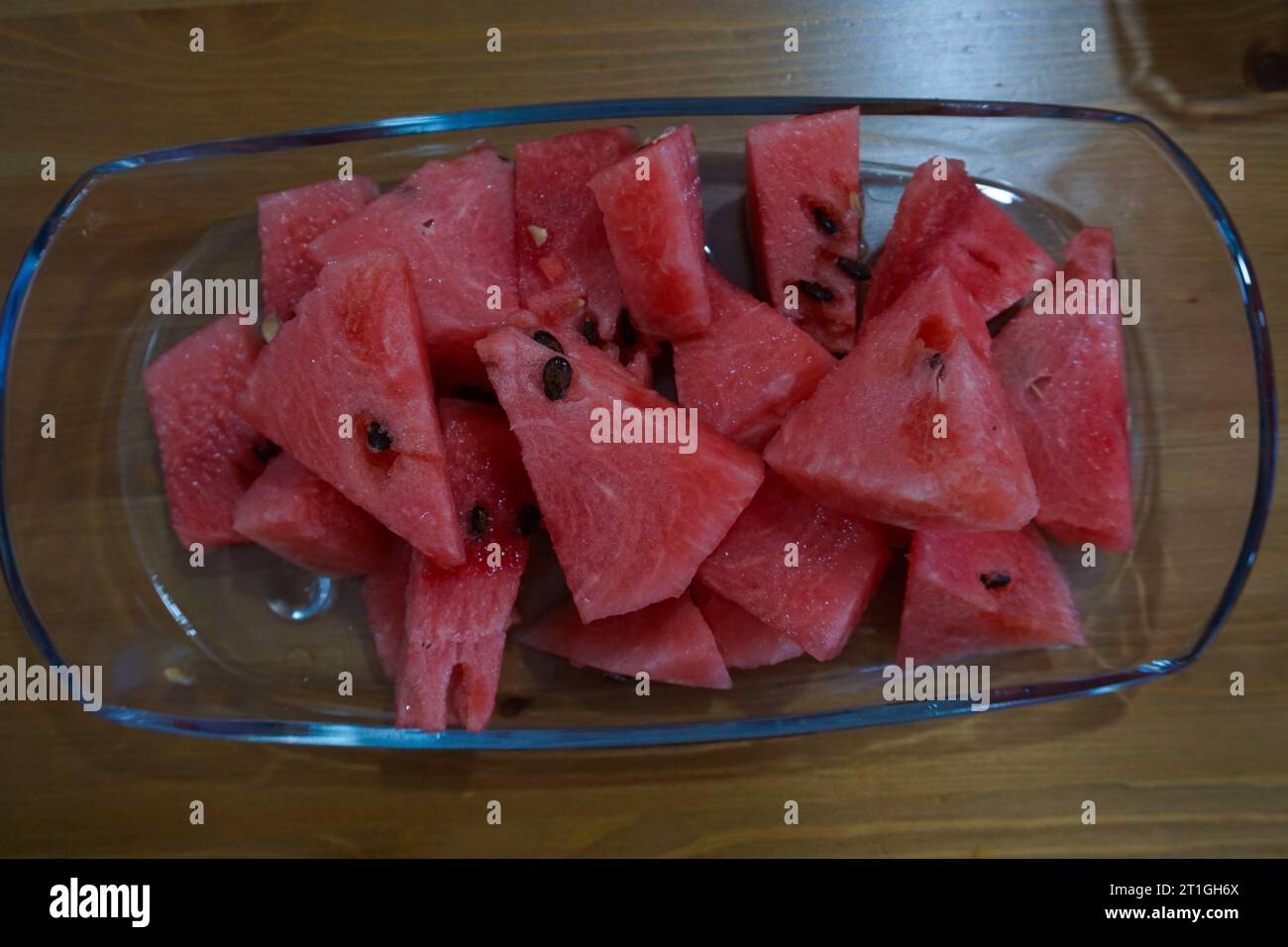 Sliced ​​watermelon. Refreshing watermelon standing on plate. Stock Photo