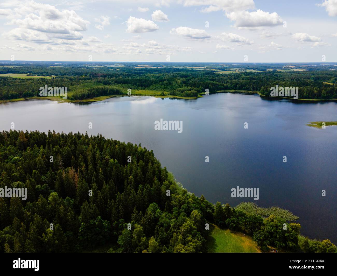 Aerial view of Ilgis Lake/Ežeras, next to Žemaitijos Nacionalinis Parkas near Beržoras, Lithuania. Stock Photo