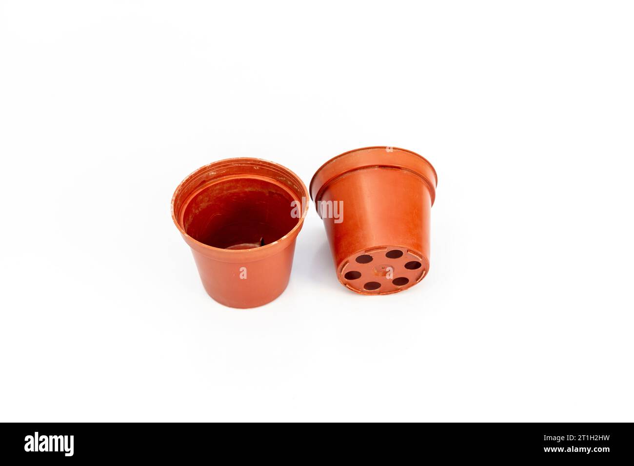 Plastic flower pot isolated on a white background Stock Photo - Alamy