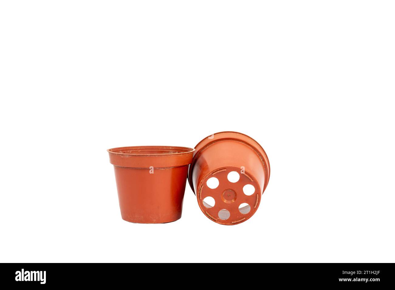 Small Plastic Plants Pots With Drainage Holes Isolated O White small-plastic-plants-pots-with-drainage-holes-isolated-o-white