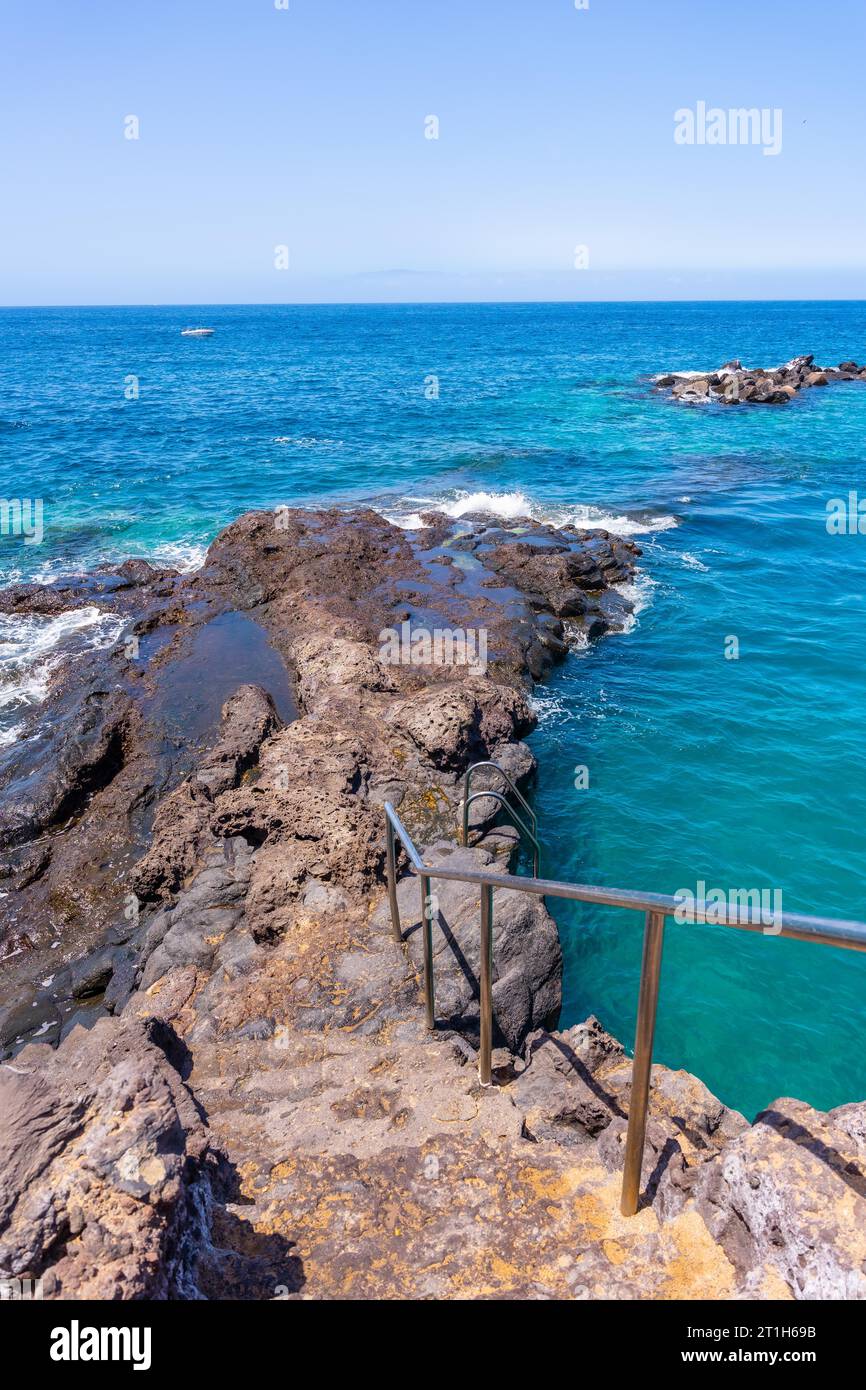 Stairs to go down to the sea at Abama beach on the west coast of Tenerife, Canary Islands Stock Photo