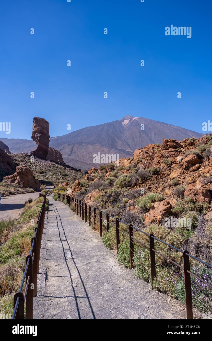 Tourist trail between the Roques de Gracia and the Roque Cinchado in the natural area of Teide in Tenerife, Canary Islands Stock Photo