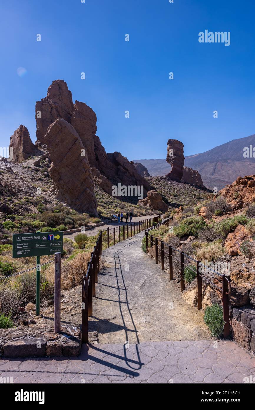 Path between the Roques de Gracia and the Roque Cinchado in the natural area of Mount Teide in Tenerife, Canary Islands Stock Photo