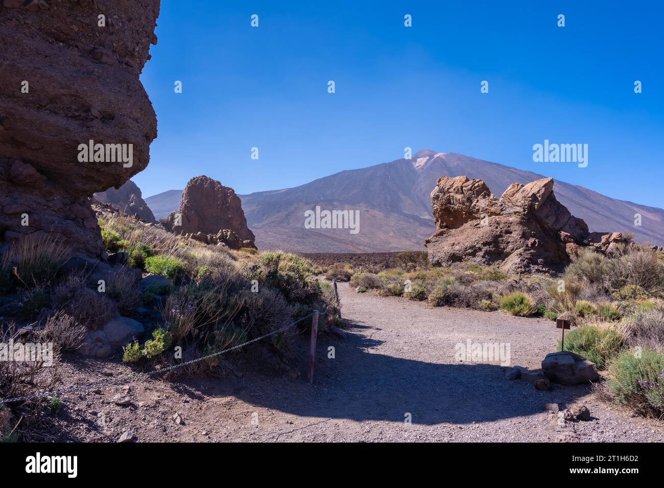 Path to walk between the Roques de Gracia and the Roque Cinchado in the natural area of Mount Teide in Tenerife, Canary Islands Stock Photo