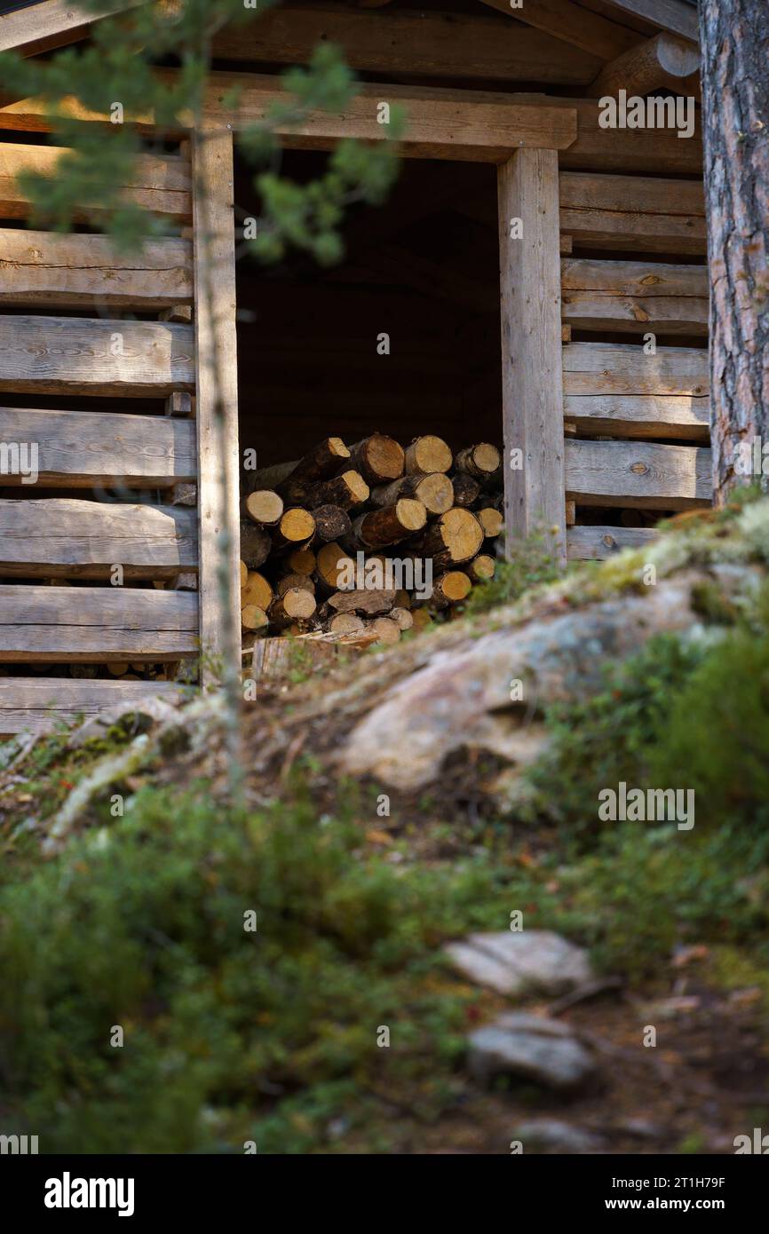 Firewood shed in Southern Konnevesi National Park, Finland. Selective focus Stock Photo