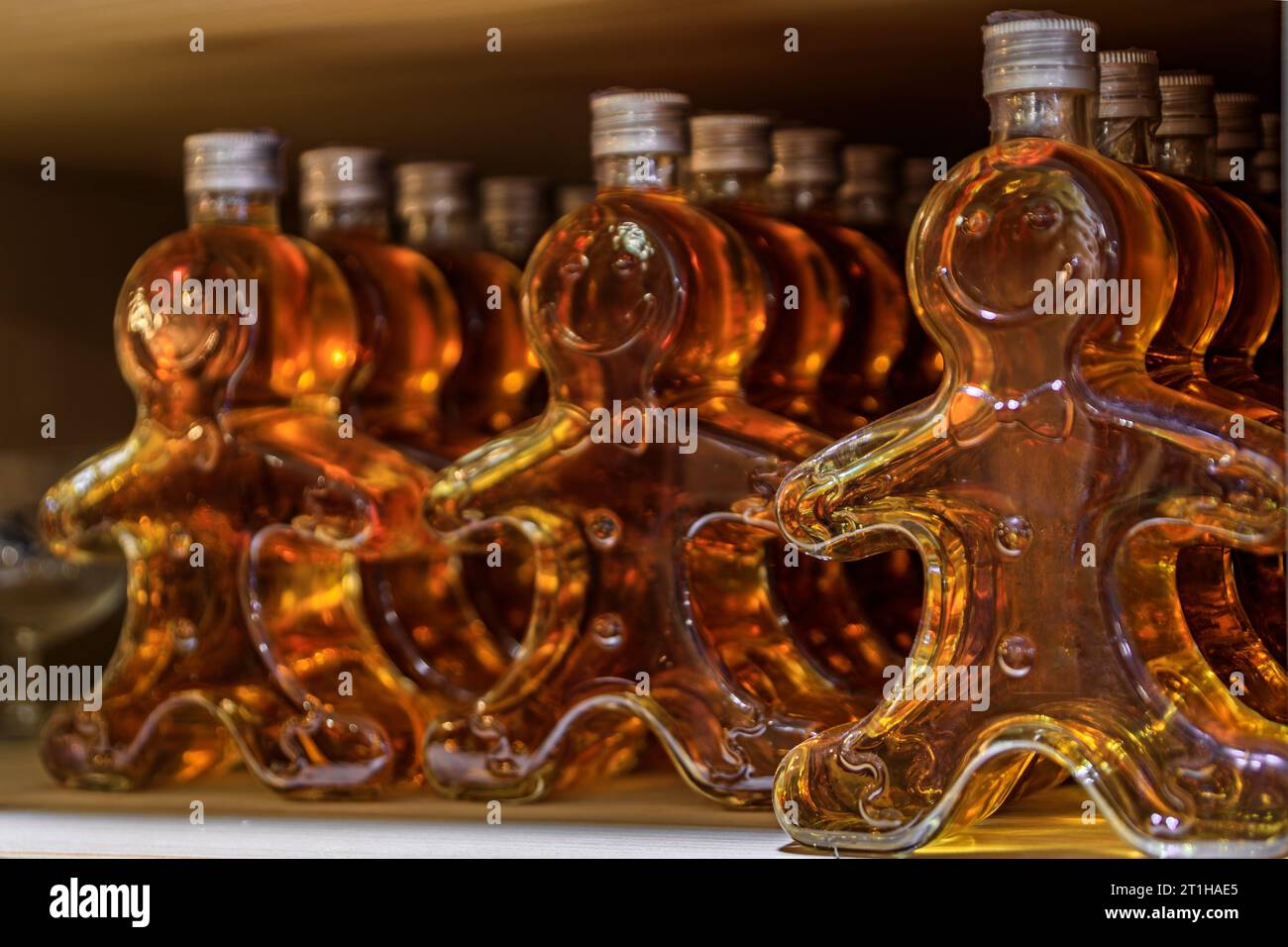 Traditional artisanal gingerbread liquor on display at a store in the Carre d'Or, the historic center of Strasbourg, Alsace, France Stock Photo