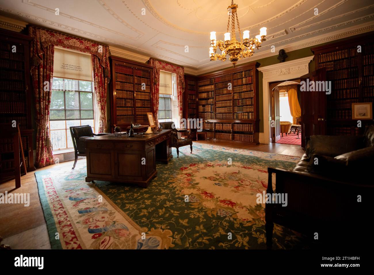 Library of Benjamin Disraeli with desk, Hughenden Manor, High Wycombe, Buckinghamshire, England, UK Stock Photo