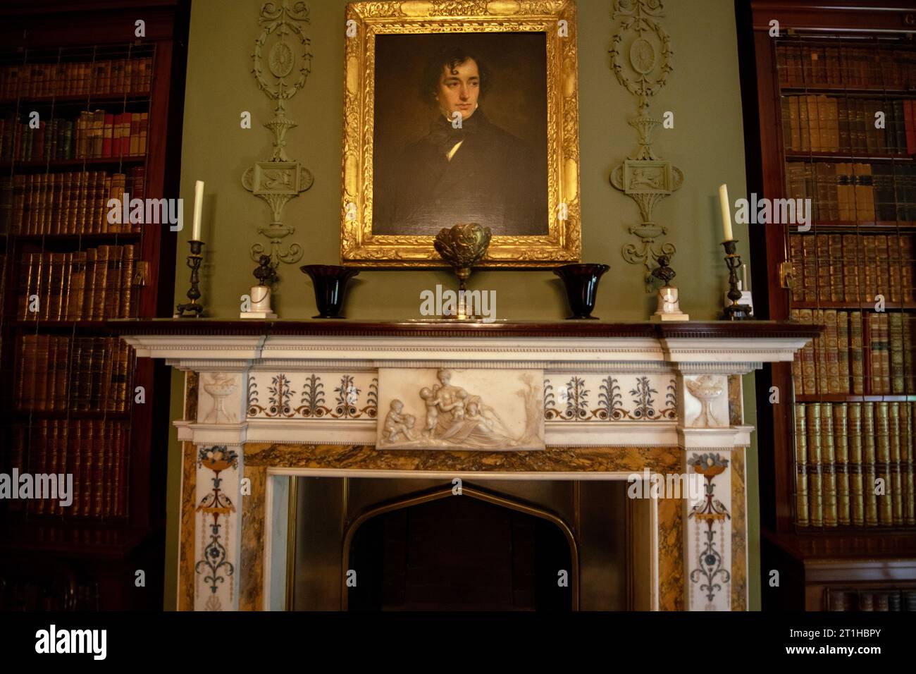 Library of Benjamin Disraeli with portrait by Sir Francis Grant, Hughenden Manor, High Wycombe, Buckinghamshire, England, UK Stock Photo