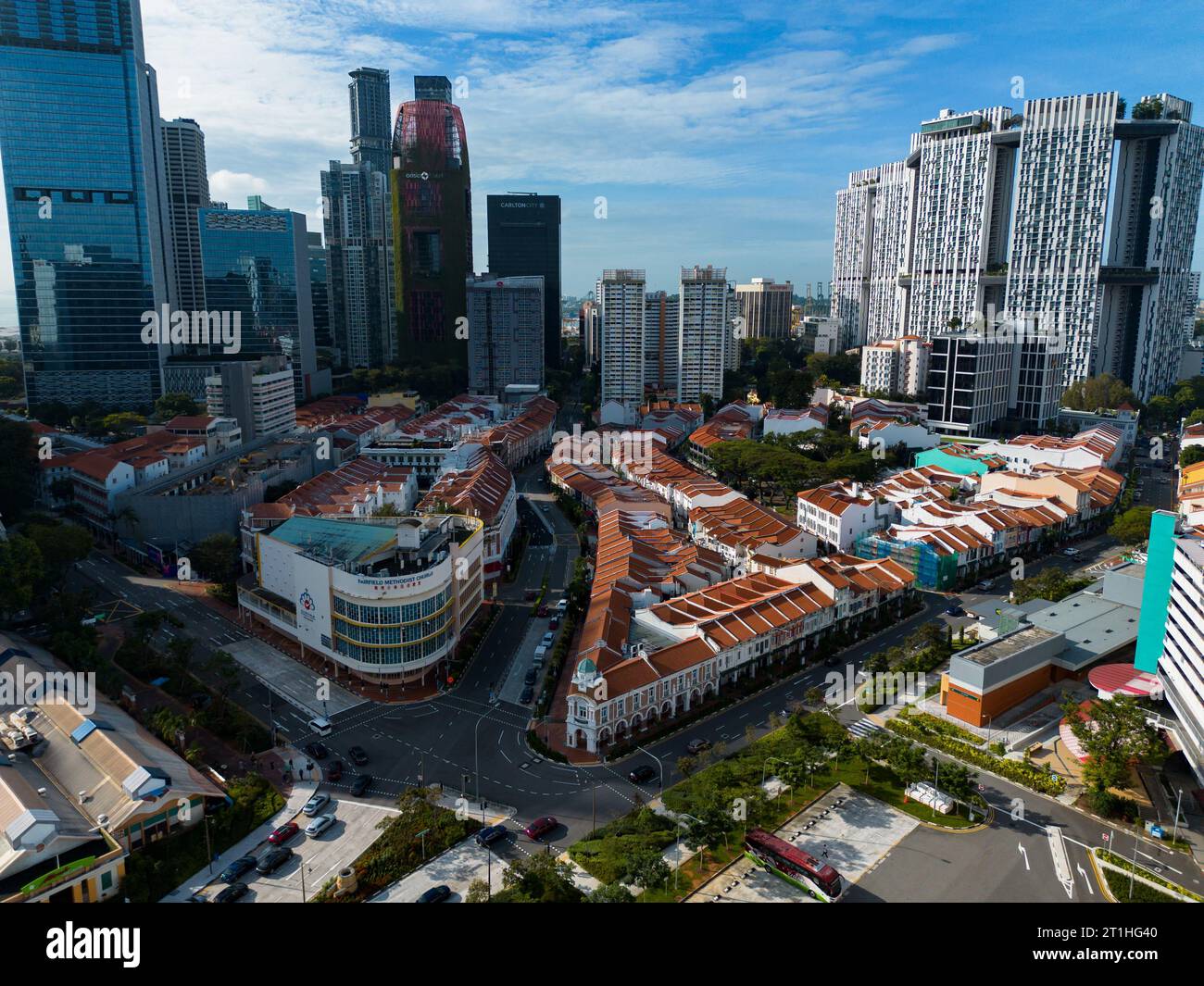 Aerial view of Singapore skyline with cars passing. Chinatown is a ...