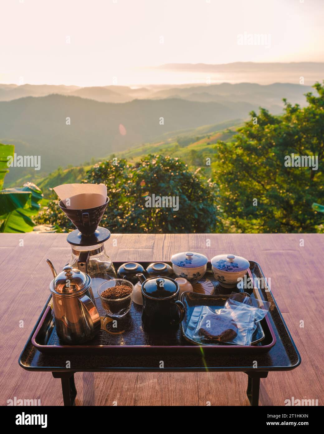drip coffee in the morning with a look at the mountains of Doi Chang Chiang Rai Thailand Stock Photo