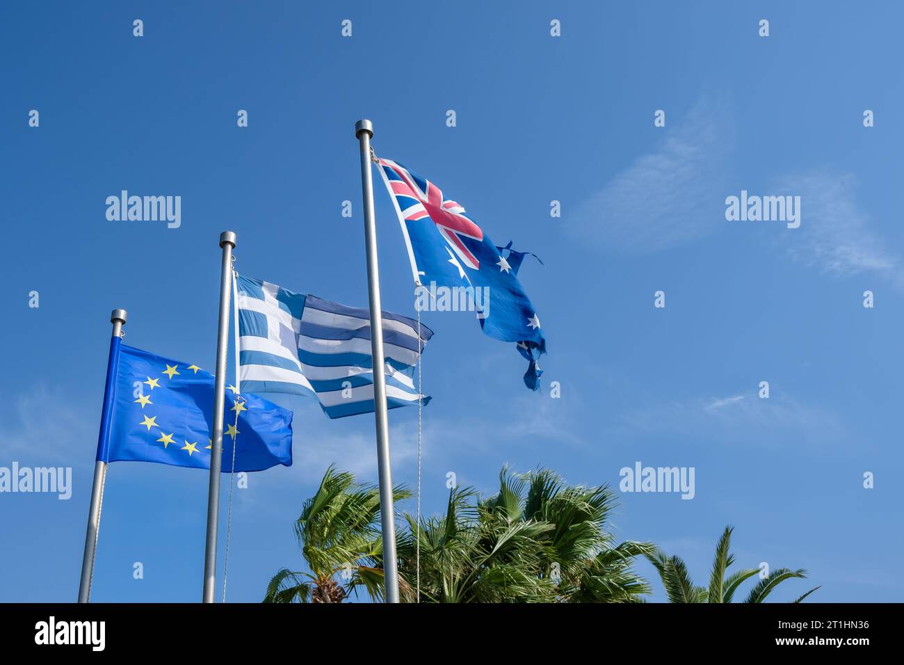 View of the Australian national flag, the Greek national flag and the flag of the European community Stock Photo