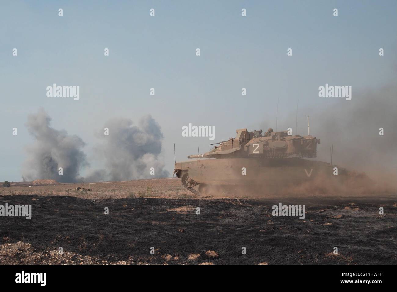 Smoke billows rise after Israeli Merkava tanks hit sites in which Hamas ...