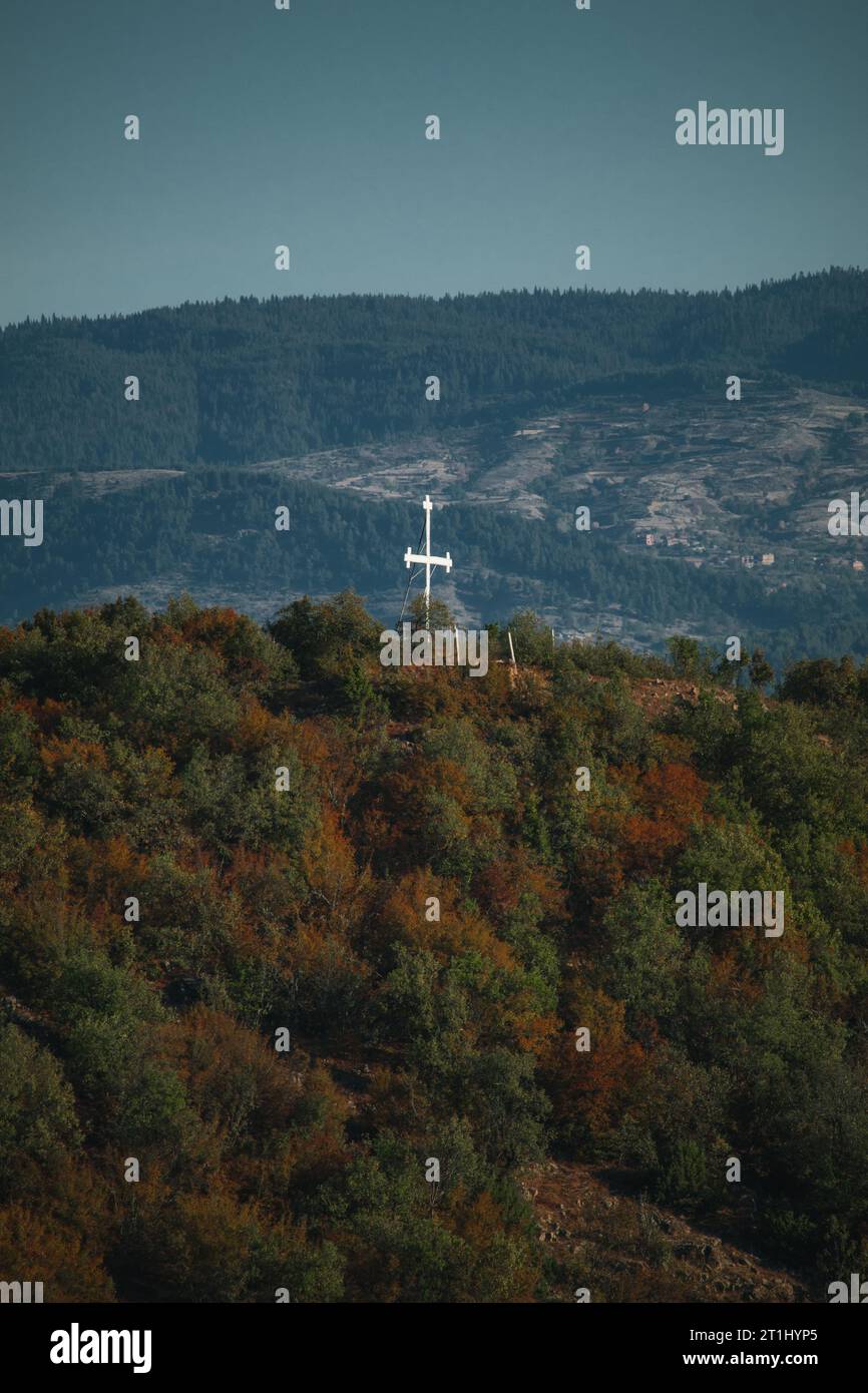 A chistian white cross on top