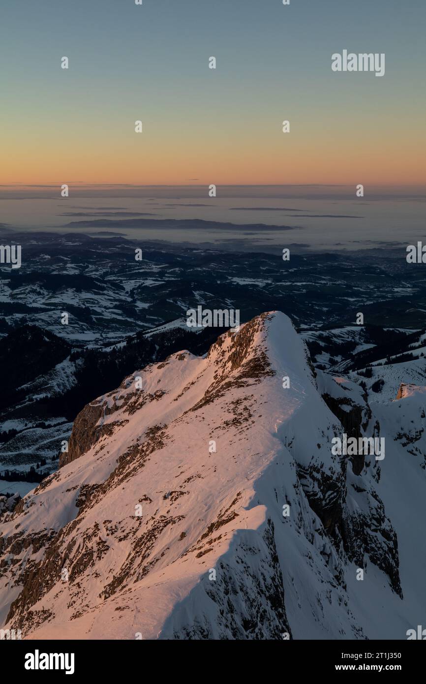 High resolution stitched panorama sunset at the famous Saentis summit, Schwaegalp, Appenzell, Alpstein, Switzerland. Stock Photo