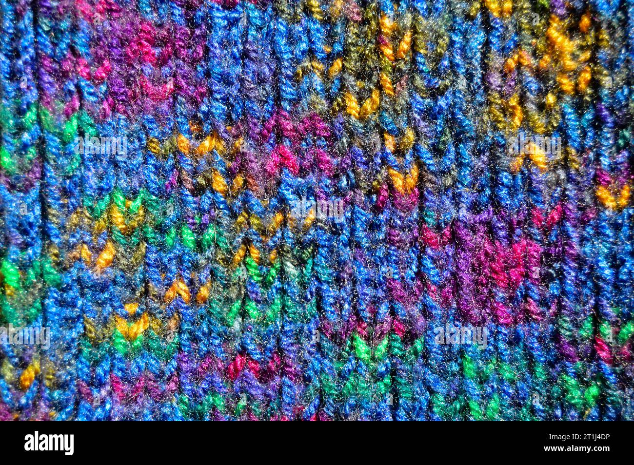 Pattern fabric made of wool. Handmade knitted fabric colored wool ...
