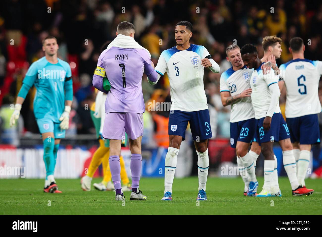 LONDON, UK - 13th Oct 2023:  Levi Colwill of England shakes hands with Mathew Ryan of Australia after the international friendly match between England Stock Photo