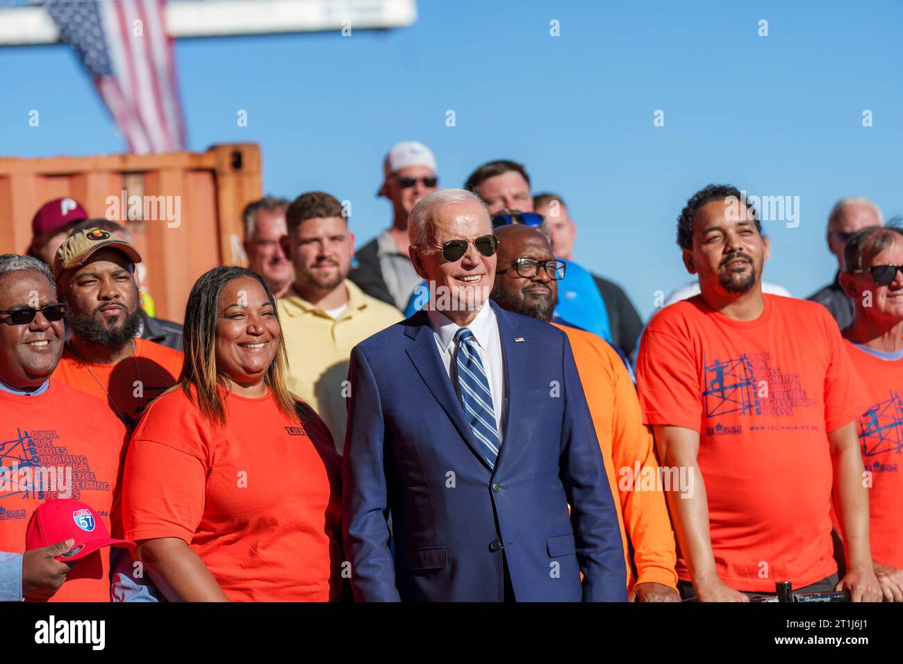 Philadelphia, United States. 13th Oct, 2023. U.S. President Joe Biden poses with construction workers before announcing funding for regional clean energy hubs during an event at the at Tioga Marine Terminal, October 13, 2023 in Philadelphia, Pennsylvania. Credit: Adam Schultz/White House Photo/Alamy Live News Stock Photo