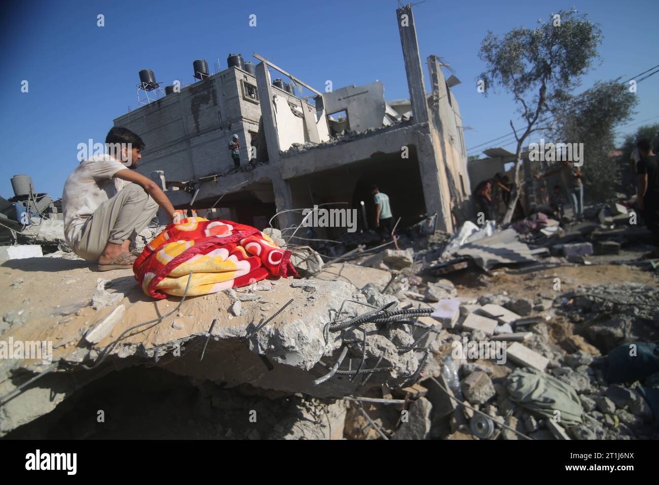 Help Rafah Rafah, Palestine. 13th Oct, 2023. Palestinians help persons injured in ...