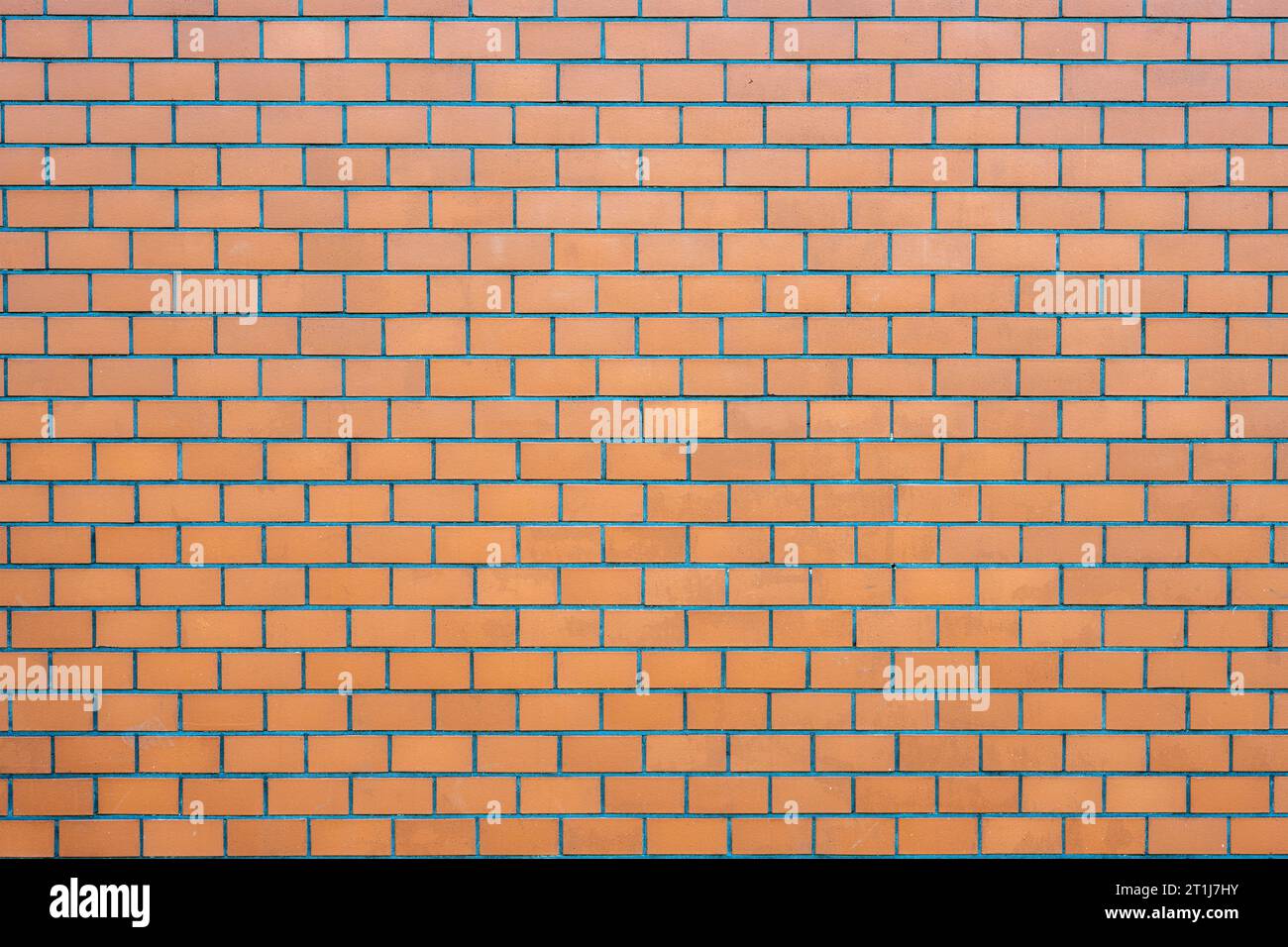 Background from a wall made of orange bricks Stock Photo
