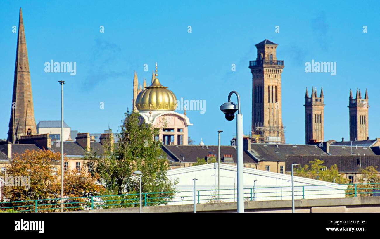 Glasgow, Scotland, UK. 14th October, 2023. UK Weather: Gurdwara Singh Sabha trinity church etc Sunny autumnal colour saw the west end’s collection of towers resplendent in the sun. Credit Gerard Ferry/Alamy Live News Stock Photo