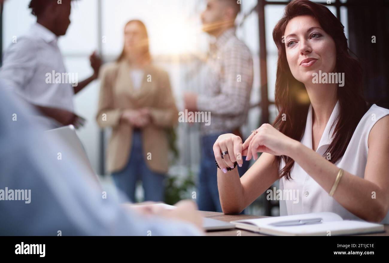 Young speaker interviewing new partners in the office Stock Photo - Alamy