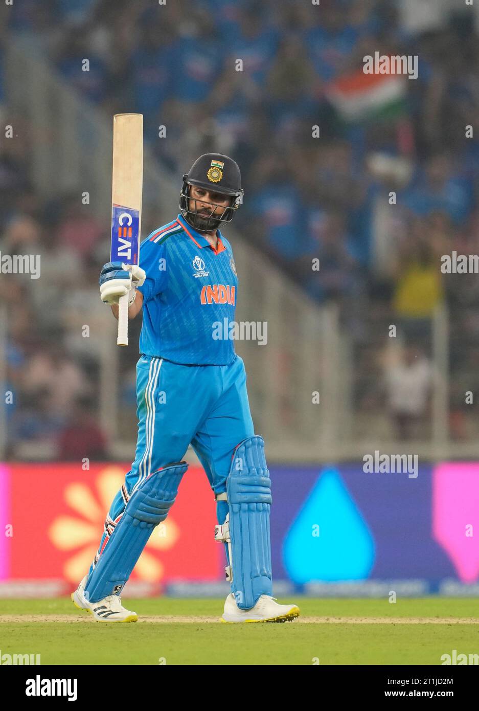 India's captain Rohit Sharma celebrates his fifty runsduring the ICC ...