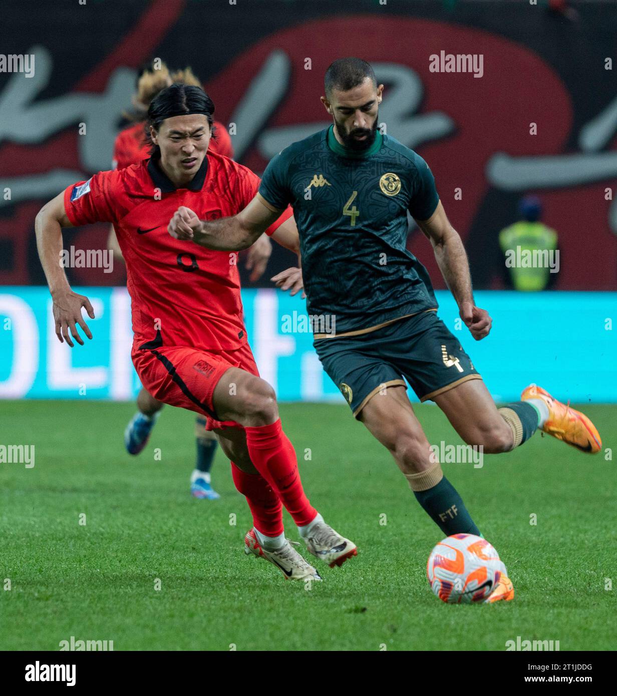 Seoul, South Korea. 13th Oct, 2023. South Korean player Cho Gue-sung (9), dribbles the ball with Yassine Meriah (4), of Tunisia during the friendly soccer match between South Korea and Tunisia at the Seoul World Cup Stadium in Seoul, South Korea on October 13, 2023. (Photo by Lee Young-ho/Sipa USA) Credit: Sipa USA/Alamy Live News Stock Photo