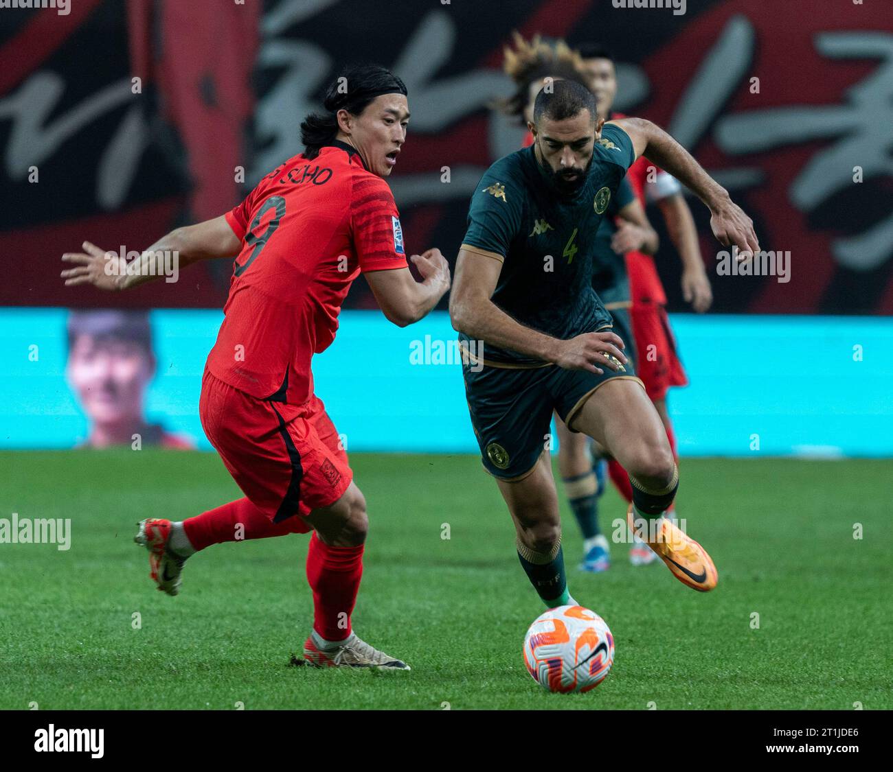 Seoul, South Korea. 13th Oct, 2023. South Korean player Cho Gue-sung (9), dribbles the ball with Yassine Meriah (4), of Tunisia during the friendly soccer match between South Korea and Tunisia at the Seoul World Cup Stadium in Seoul, South Korea on October 13, 2023. (Photo by Lee Young-ho/Sipa USA) Credit: Sipa USA/Alamy Live News Stock Photo