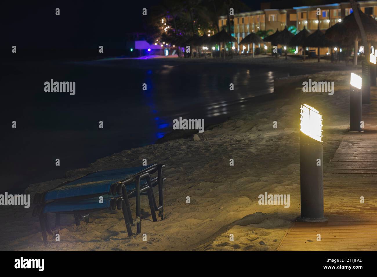 Night view of Caribbean sea with hotels sandy beach with consecrated