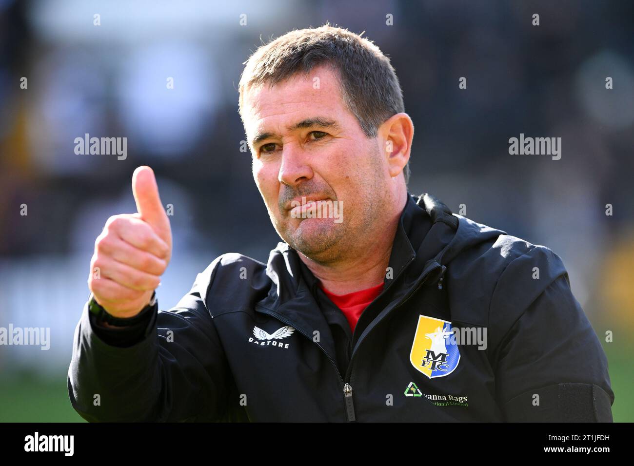 Nigel Clough, manager of Mansfield Town gives a thumbs-up after a 1-4 ...