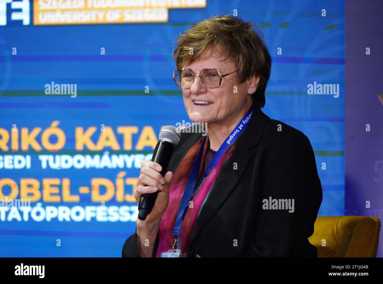 Szeged, Hungary. 12th Oct, 2023. Biochemist Katalin Kariko, 2023 Nobel laureate in physiology or medicine, talks to students during a panel discussion at the University of Szeged in Szeged, Hungary, Oct. 12, 2023. TO GO WITH 'Nobel laureate Kariko underscores groundbreaking potential of mRNA technology' Credit: Chen Hao/Xinhua/Alamy Live News Stock Photo