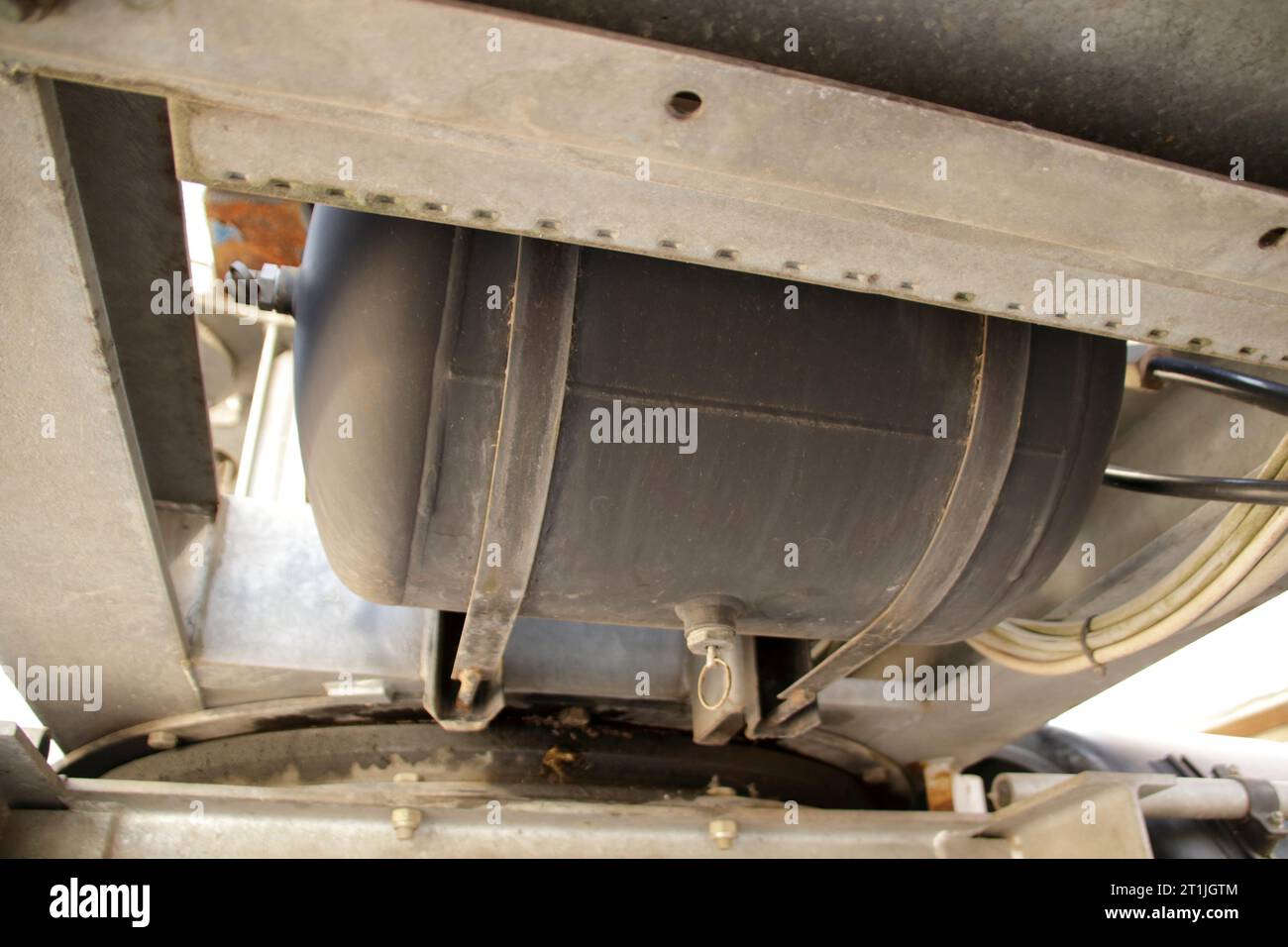 Air tank of a compressed air brake under a truck Stock Photo