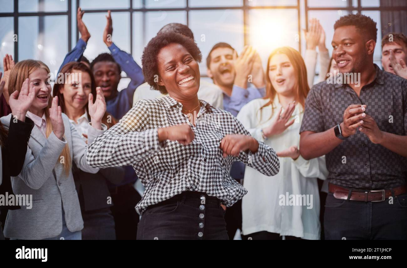 Business team celebrating a triumph with arms up Stock Photo - Alamy