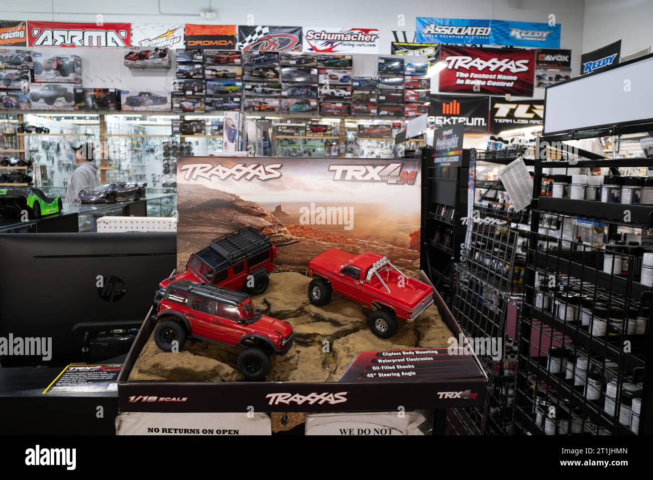 Traxxas TRX4M radio controlled crawler truck display at an RC hobby shop Stock Photo