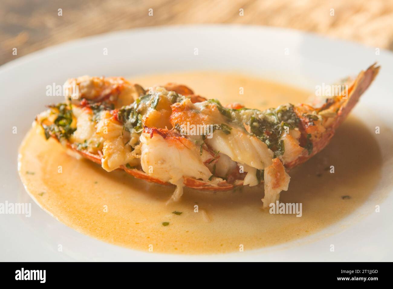 A homecooked lobster thermidor, made from a lobster, Homarus gammarus, caught in the English Channel. Dorset England UK GB Stock Photo