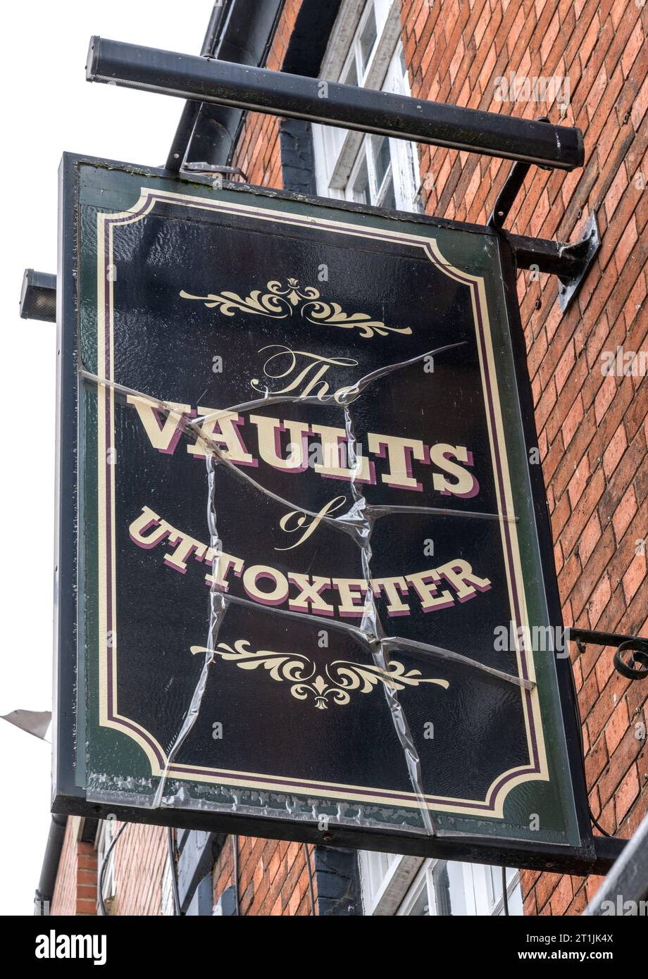 Traditional hanging pub sign at The Vaults of Uttoxeter, Market Place, Uttoxeter, Staffordshire, England, UK Stock Photo