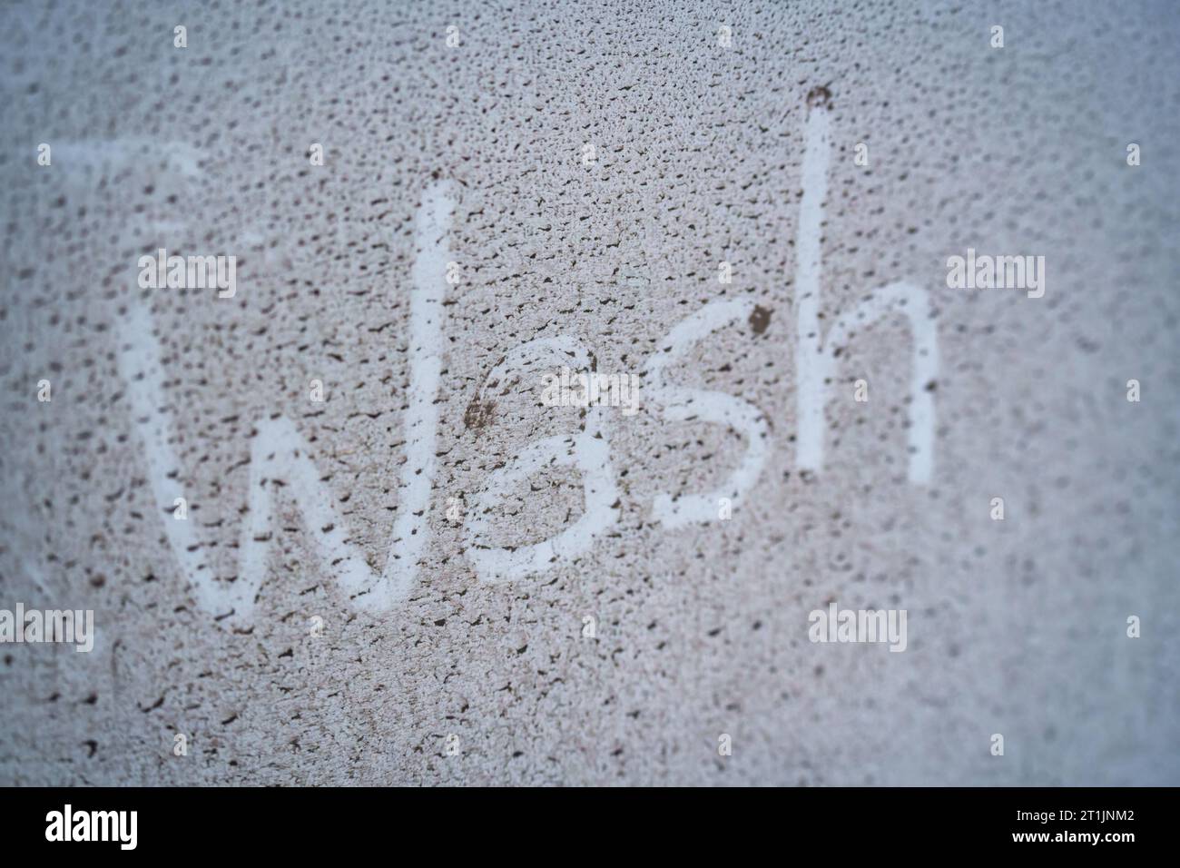 Dirty and mud stain on white car surface Stock Photo