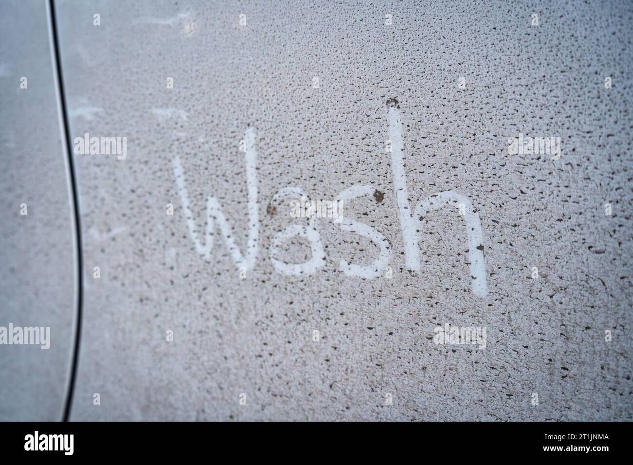 Dirty and mud stain on white car surface Stock Photo