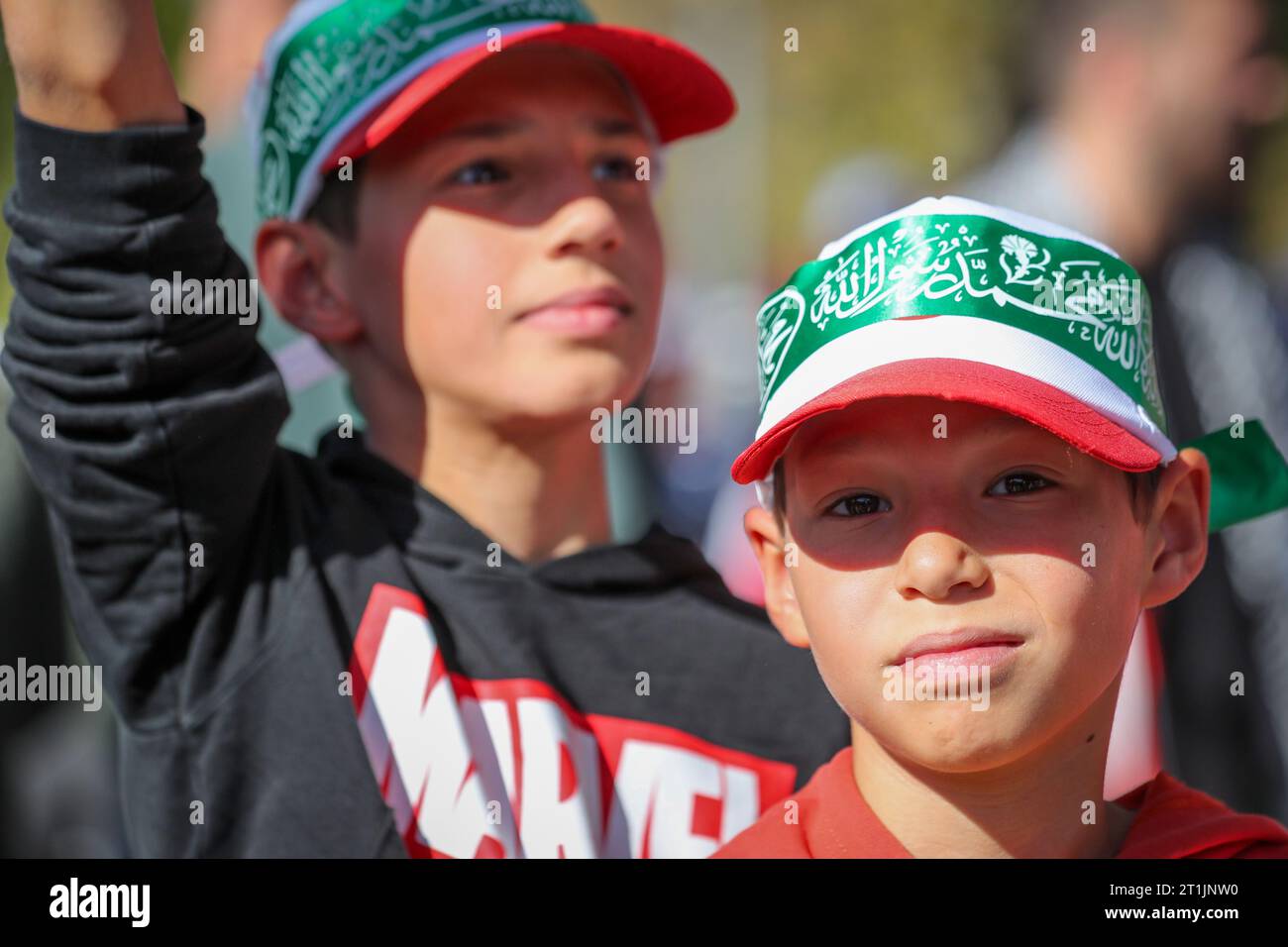 Ankara, Turkey. 14th Oct, 2023. Two boys wear takbir headbands during ...