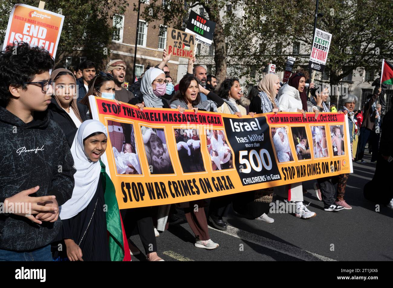 On October 14th 2023  thousands of people marched through Central London to demand an end to the bombing in Gaza. Stock Photo